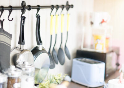 Kitchen equipment are hung on the wall - The Closet Company
